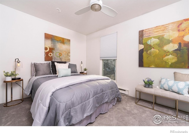 bedroom with ceiling fan, baseboard heating, and carpet flooring