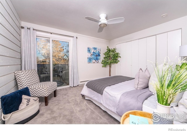 bedroom featuring ceiling fan, light colored carpet, a closet, and access to exterior