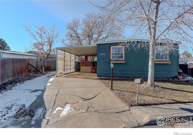 view of outbuilding with a carport