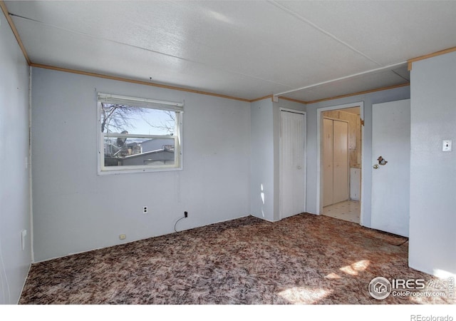 view of carpeted spare room