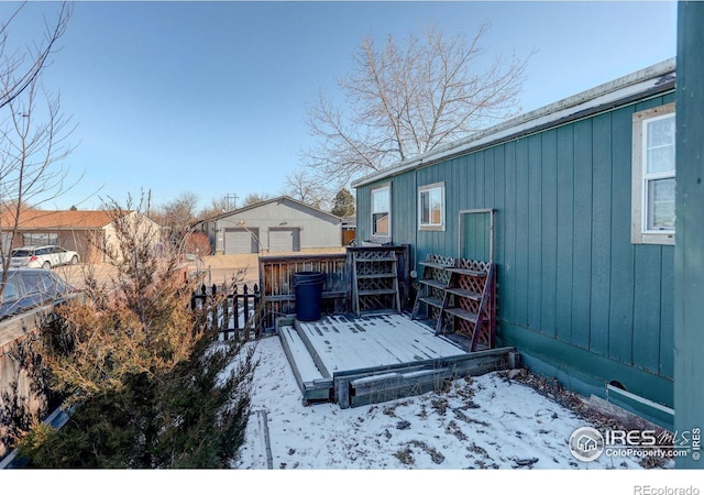 view of snow covered deck