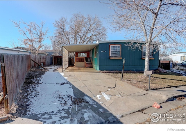 view of front of house with a carport