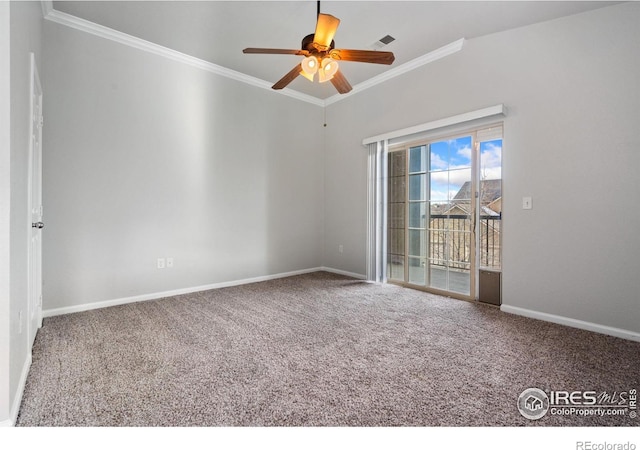 empty room featuring carpet floors, ceiling fan, and crown molding