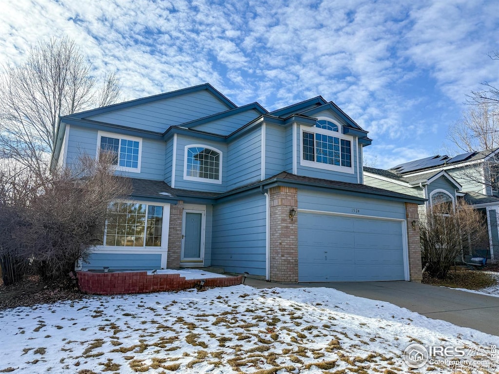 view of property featuring a garage