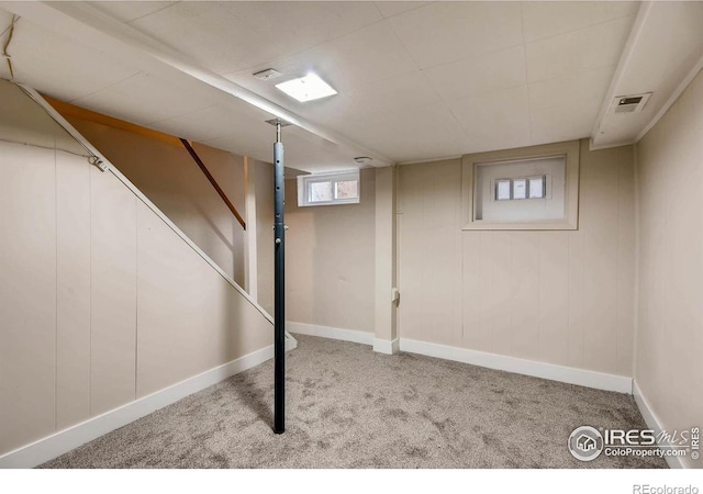 basement with light carpet