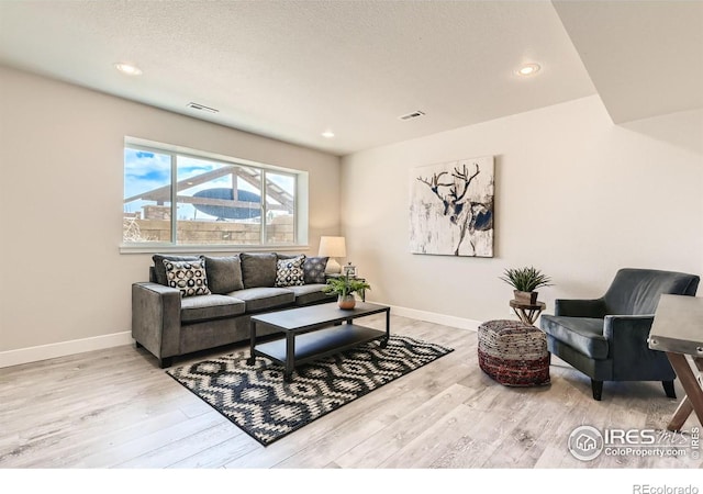 living room with hardwood / wood-style flooring