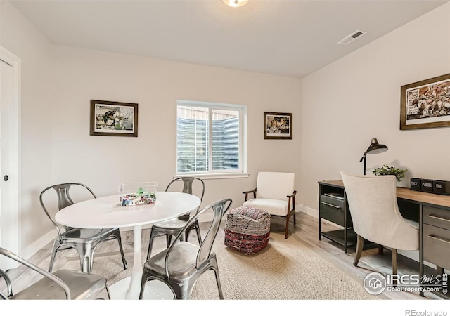 dining area featuring light hardwood / wood-style flooring