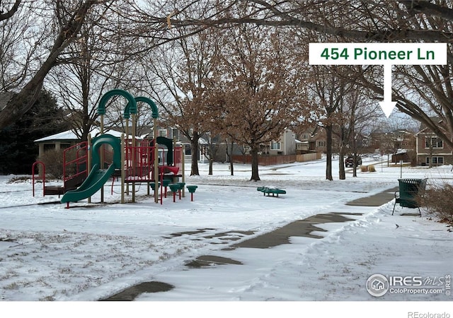 snow covered playground with playground community