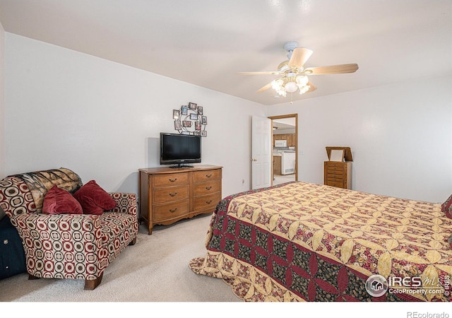 bedroom featuring ceiling fan and light carpet