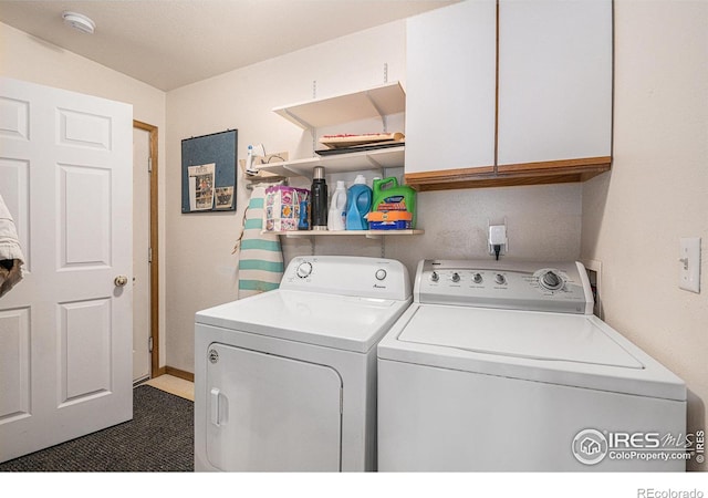 laundry area with cabinets and independent washer and dryer