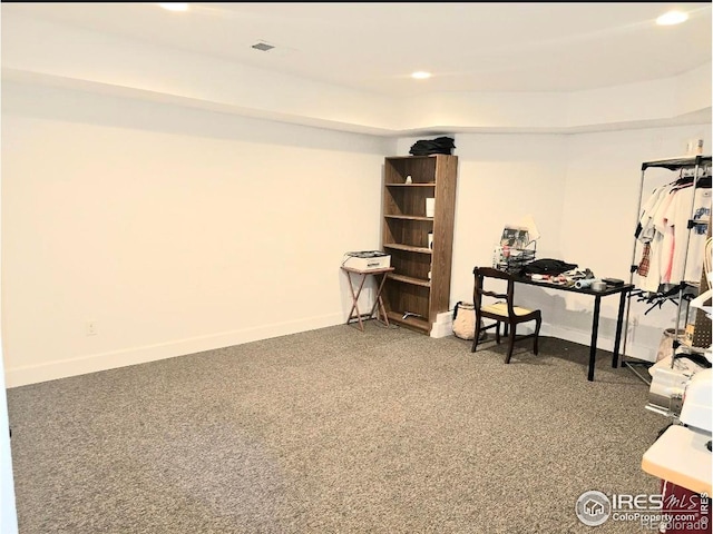 unfurnished office featuring carpet flooring