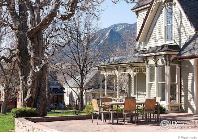 view of patio with a mountain view