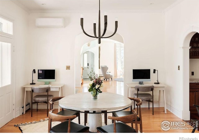 dining area with crown molding, light wood-type flooring, a baseboard radiator, a wall unit AC, and a chandelier