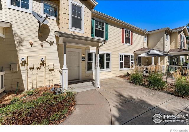 doorway to property with a patio area