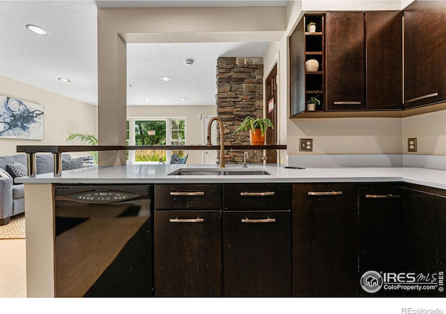 kitchen with sink, dark brown cabinetry, and black dishwasher