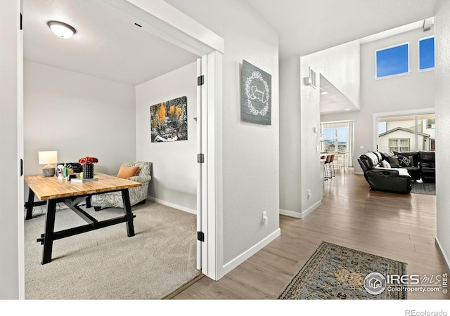 office area with light hardwood / wood-style flooring