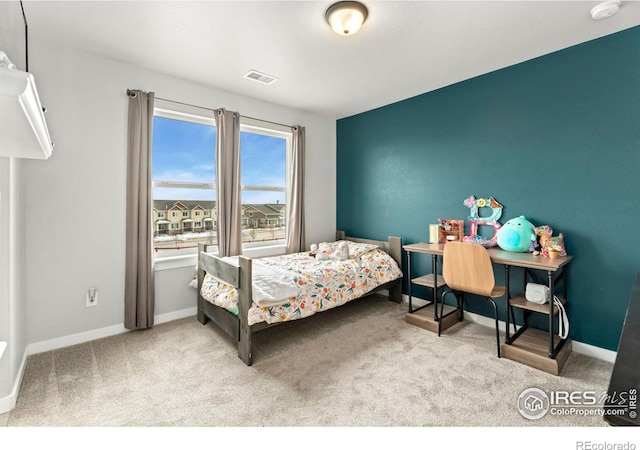 bedroom featuring carpet flooring