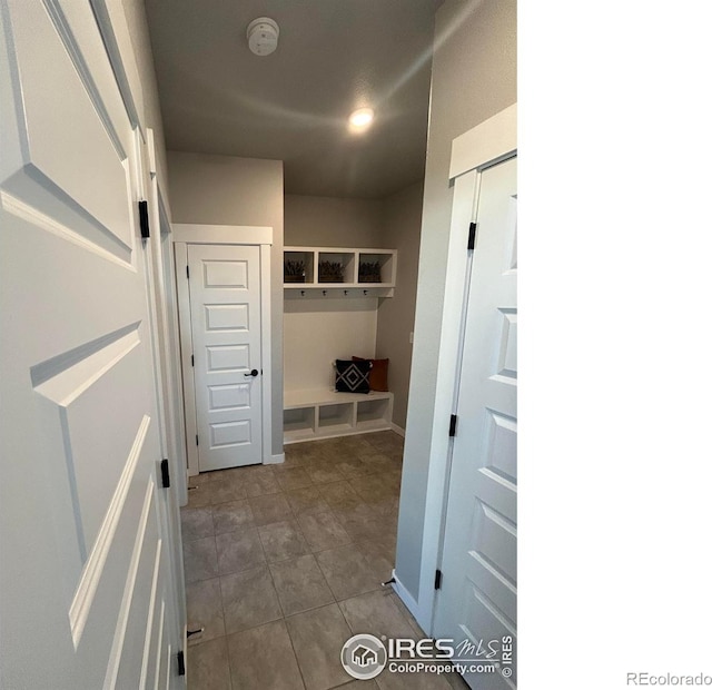 mudroom featuring tile patterned floors