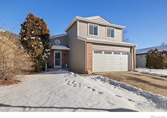 front of property with a garage