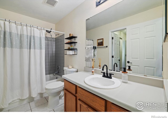 full bathroom with shower / tub combo, tile patterned flooring, vanity, and toilet