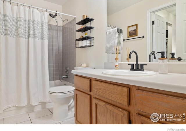 full bathroom with vanity, tile patterned flooring, toilet, and shower / bath combo with shower curtain