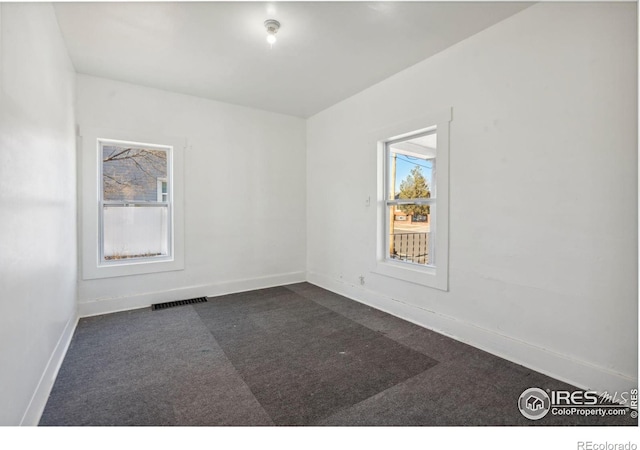 view of carpeted spare room