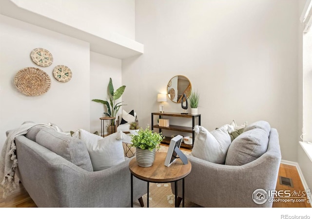 living room with hardwood / wood-style flooring