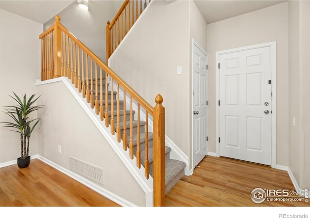 foyer with light wood-type flooring