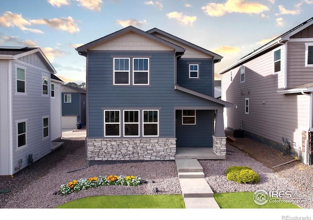 view of front of home with cooling unit