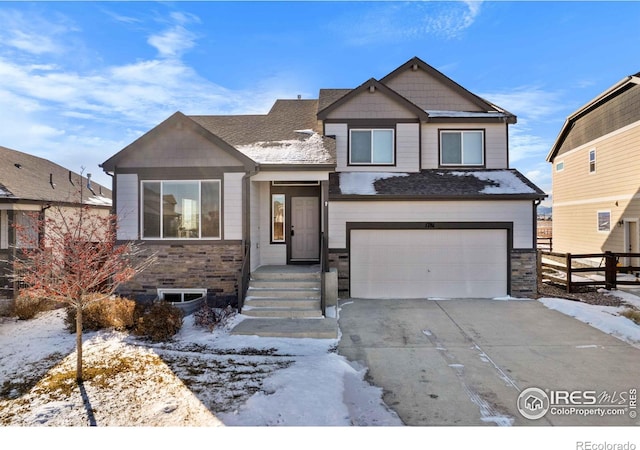 view of front of property featuring a garage