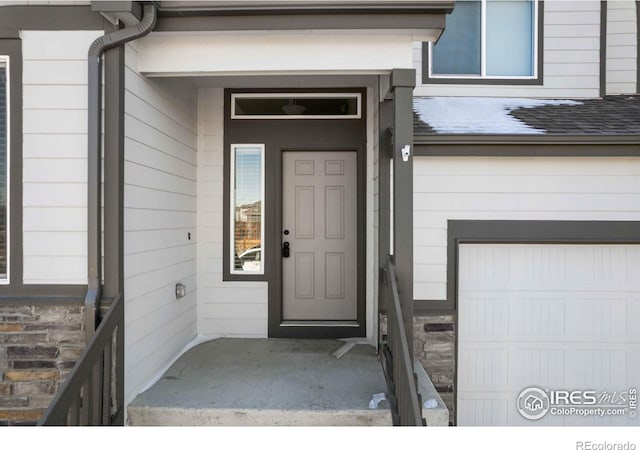 entrance to property with a garage