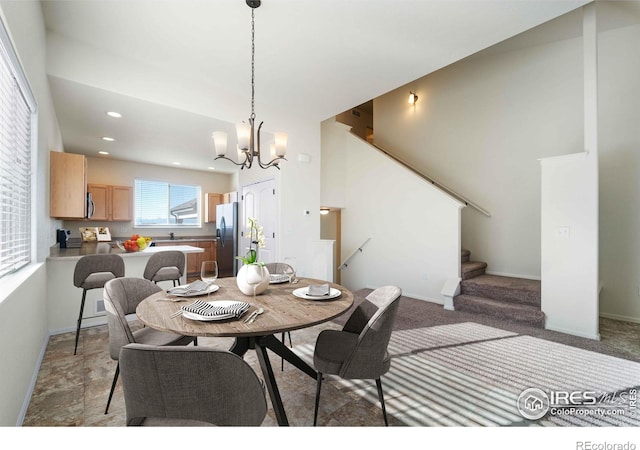 dining room with a chandelier