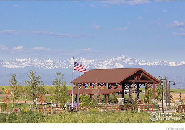 view of property's community with a mountain view and a gazebo