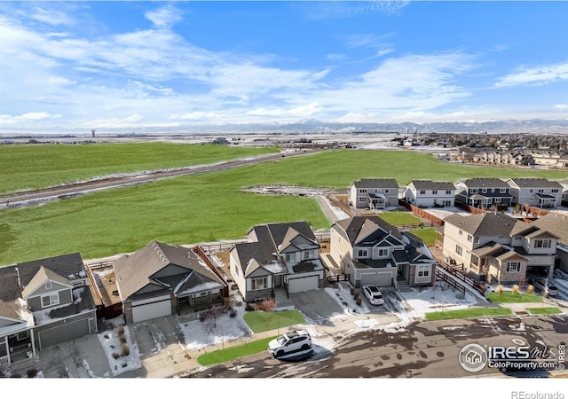 birds eye view of property with a residential view