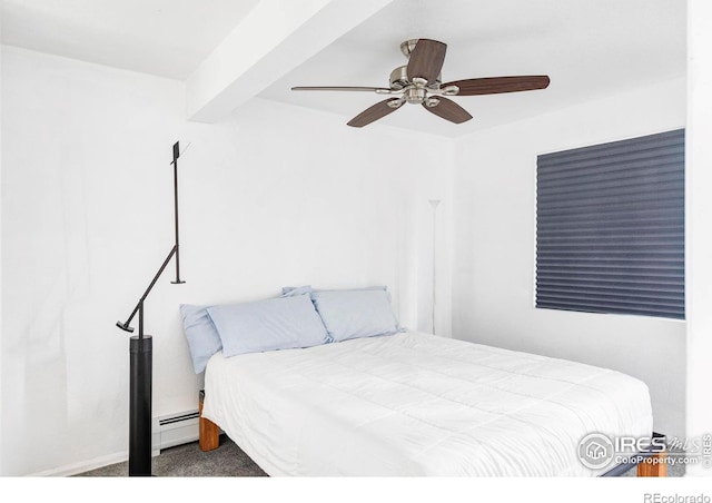 bedroom with a baseboard radiator, ceiling fan, carpet, and beamed ceiling