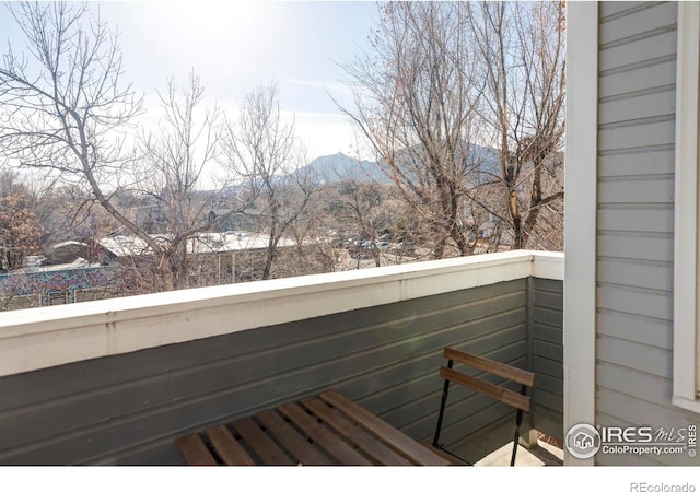 balcony featuring a mountain view