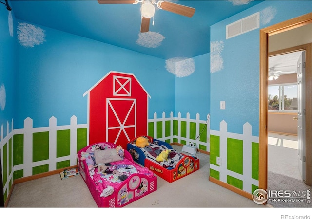 carpeted bedroom featuring ceiling fan