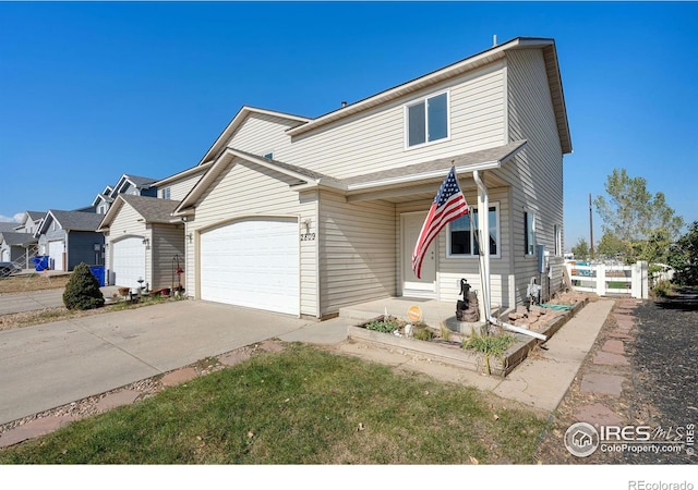 front of property featuring a garage