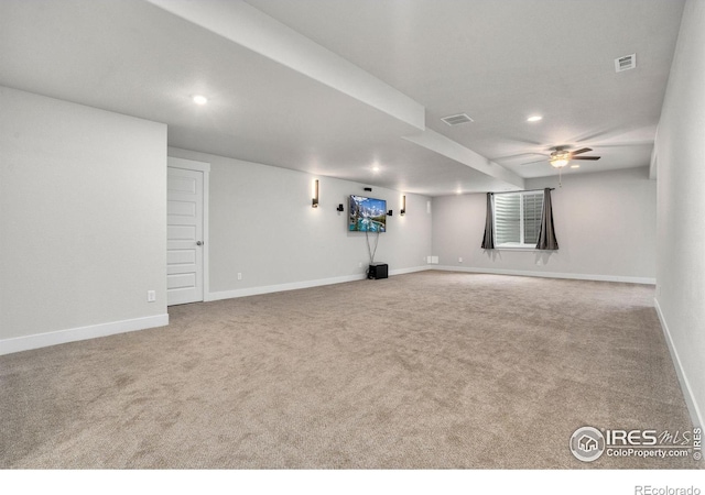 spare room with carpet and ceiling fan