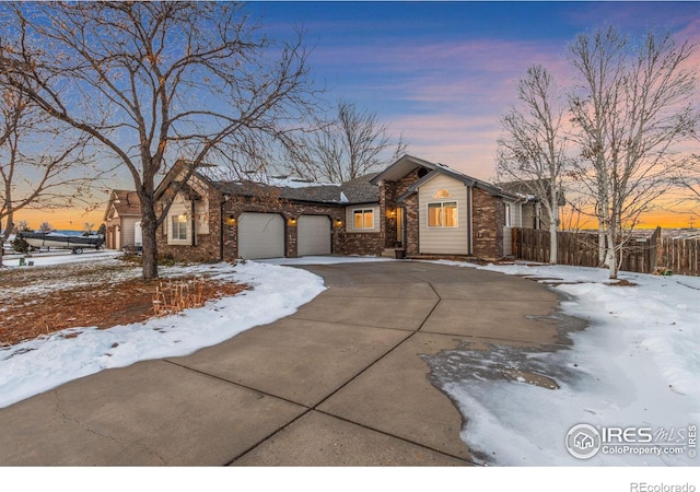 single story home featuring a garage