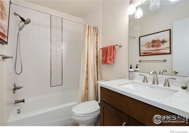 full bathroom with shower / tub combo with curtain, vanity, and toilet