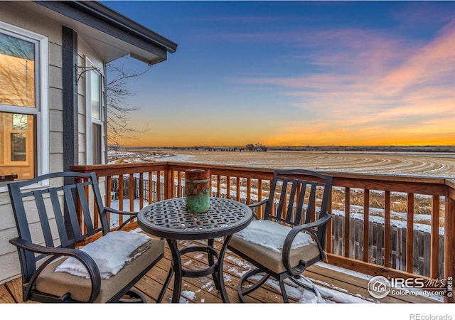 view of snow covered deck