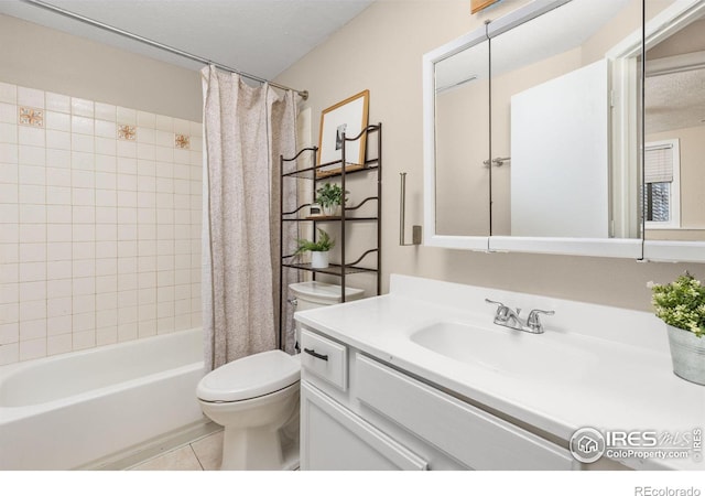 full bathroom featuring toilet, tile patterned floors, shower / tub combo with curtain, and vanity