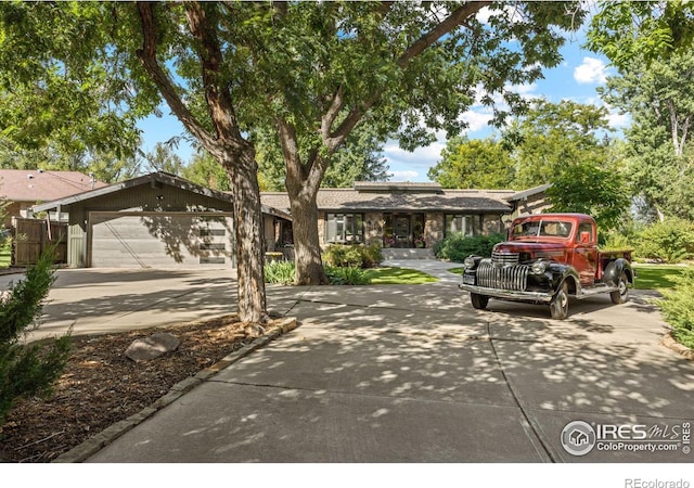 ranch-style house featuring a garage