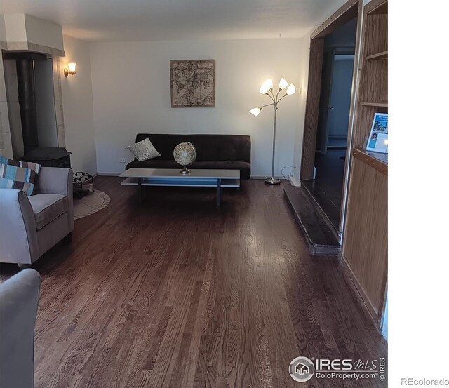 living room featuring dark hardwood / wood-style flooring