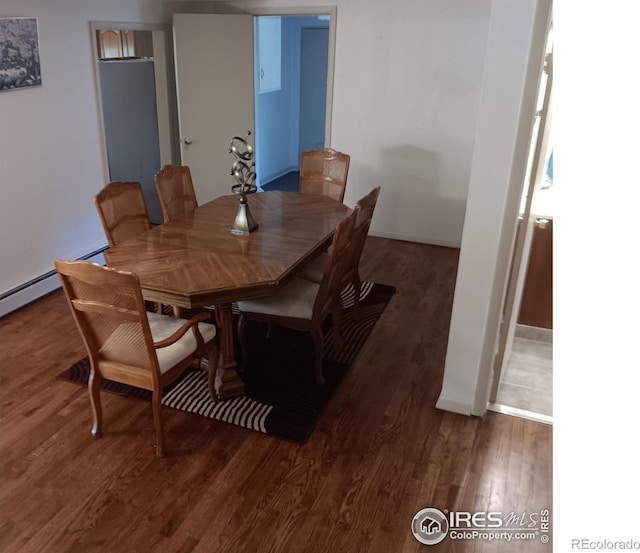 dining room featuring dark hardwood / wood-style floors