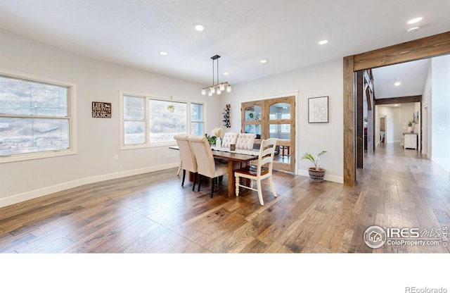 dining area featuring dark hardwood / wood-style flooring