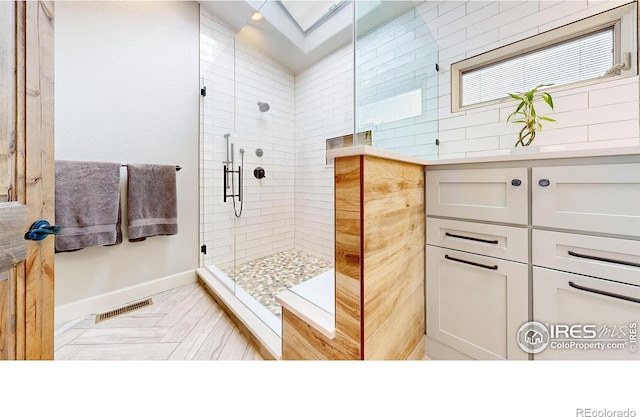 bathroom with an enclosed shower