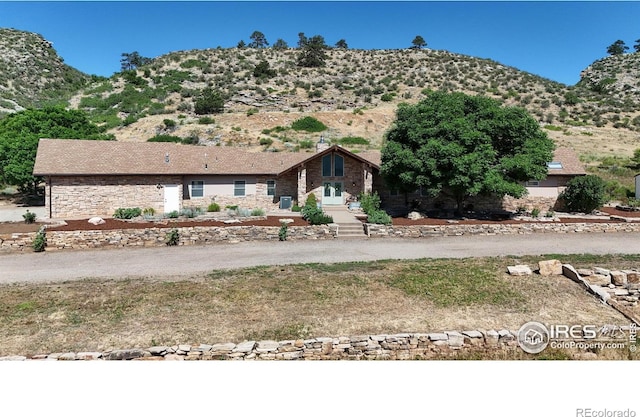 view of front of house with a mountain view