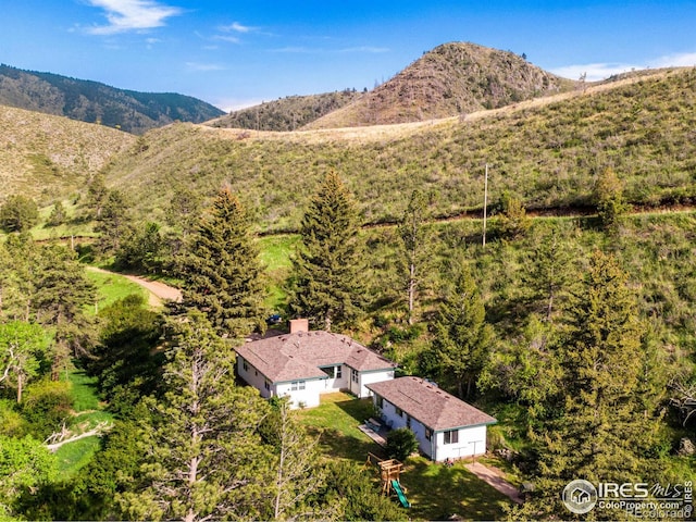 drone / aerial view featuring a mountain view